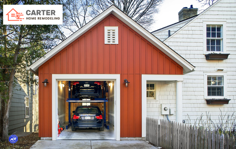 Two cars parked vertically in a spacious garage
