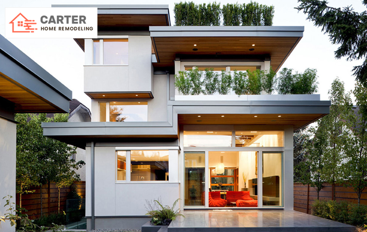 Stylush home exterior design with big windows and greenery.